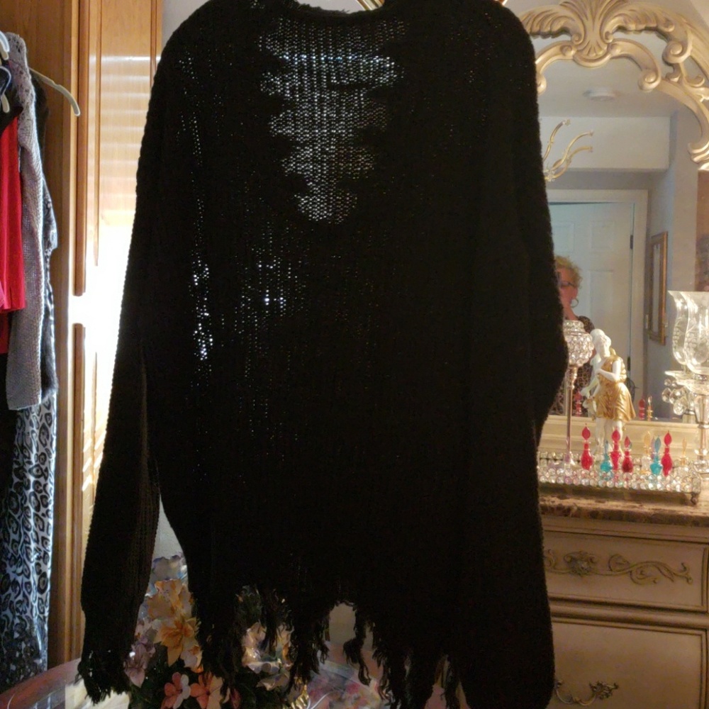 Beautiful black sweater brand new without tags.